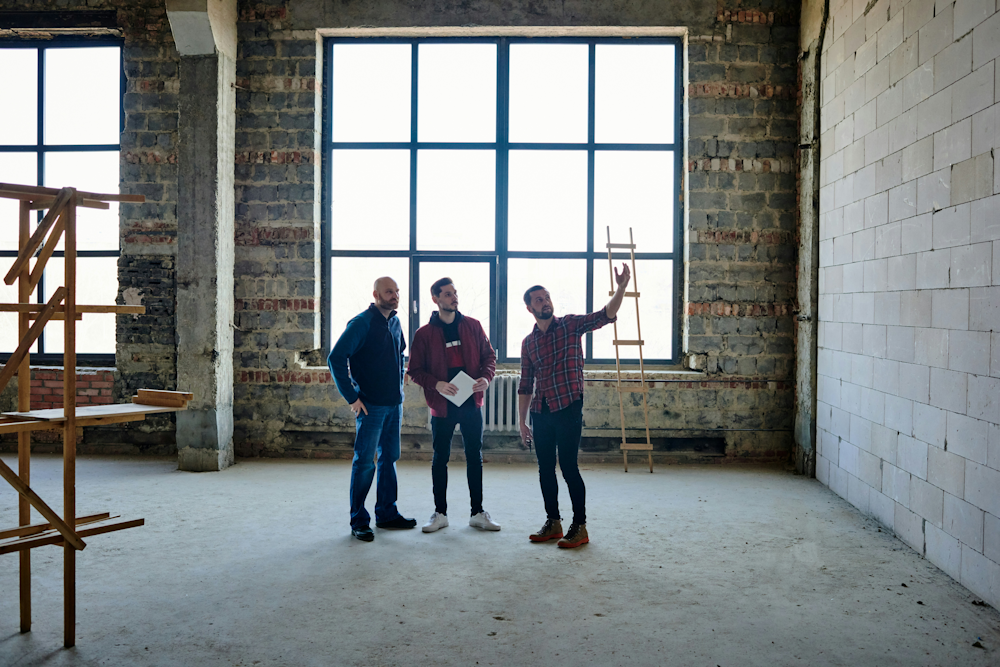 People reviewing blueprints